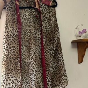 Leopard Print Sleeveless Blouse with Red Accents